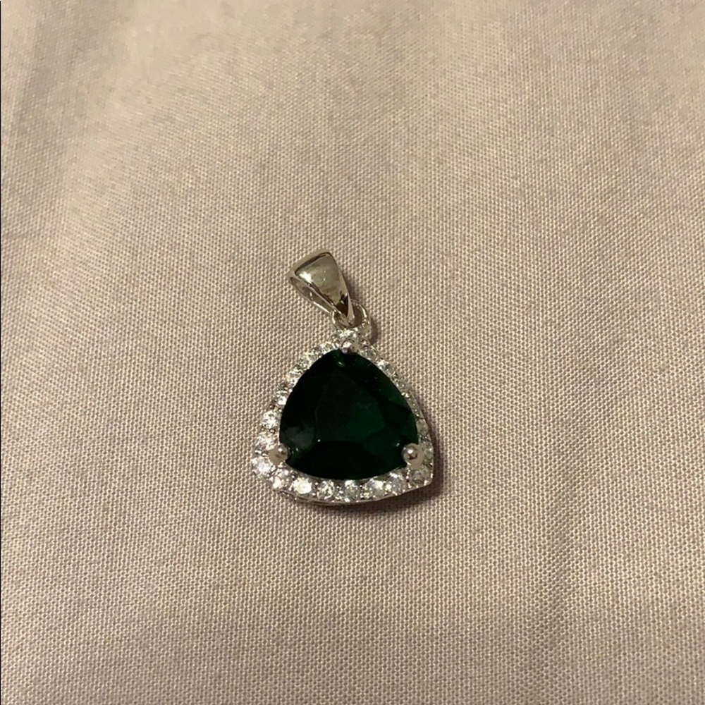 Sterling silver pendent with crystal accents.